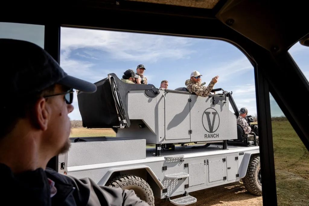 Hunting party in the ranch vehicle