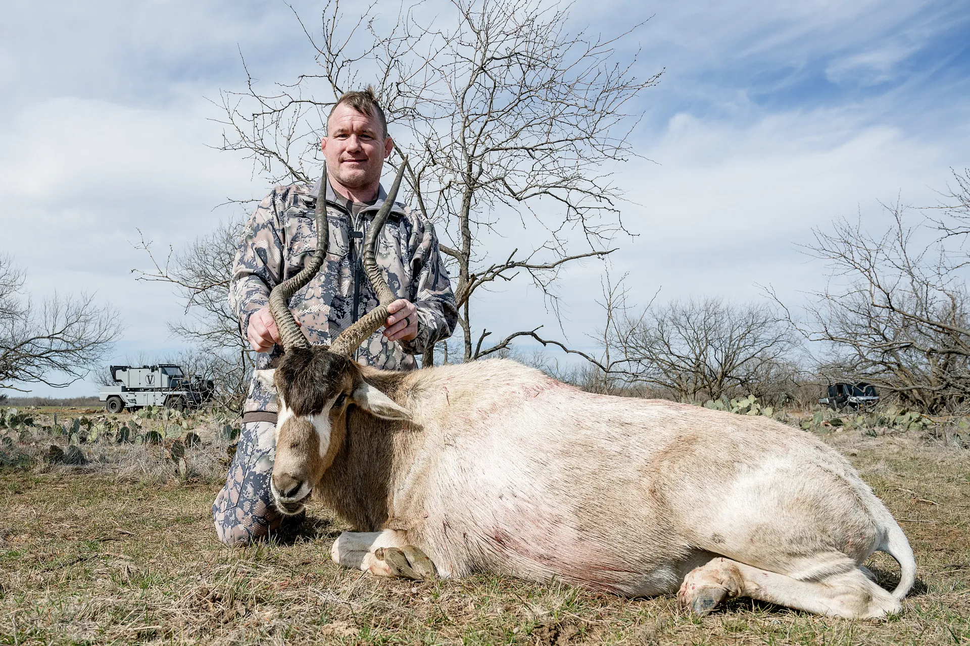 Hunter with a trophy in the field