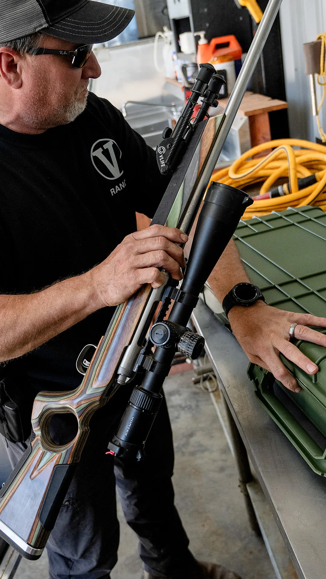 Guide preparing a scoped rifle